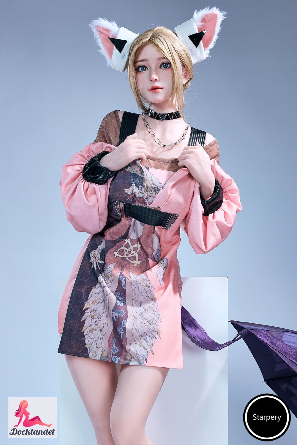 Winnie 152 cm Jarliet silicone baby doll standing naked by the beach at sunset with naturally curvy body and brown hair.